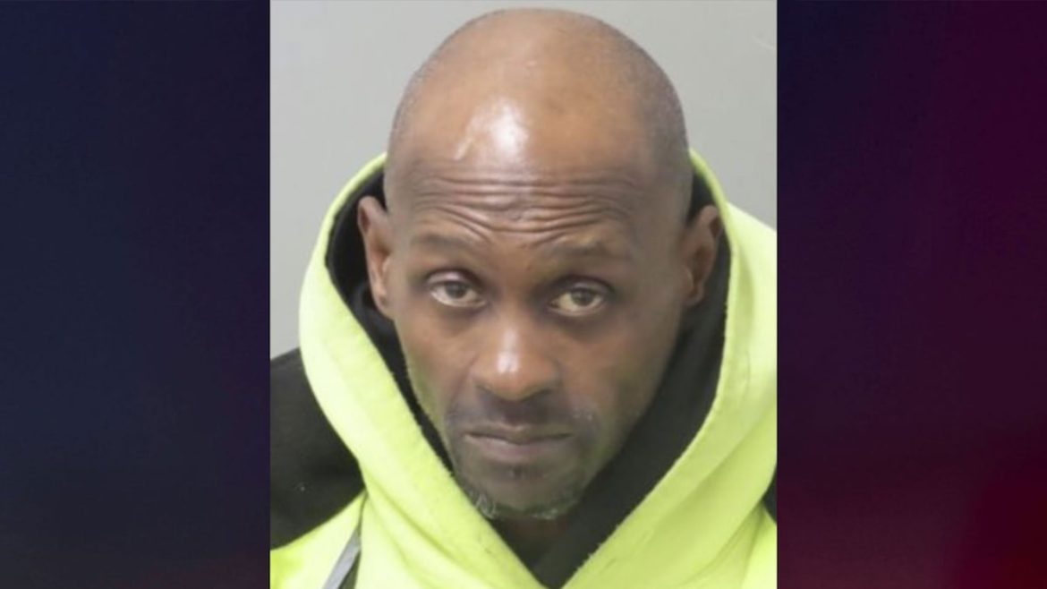 Man charged after decomposing, partially frozen body found next door to his home